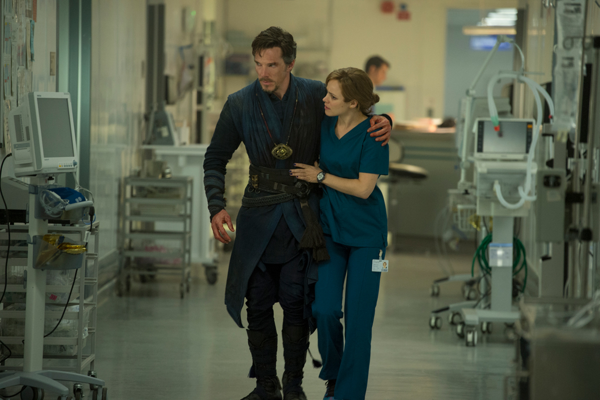 A still of Doctor strange being helped to walk through a hospital